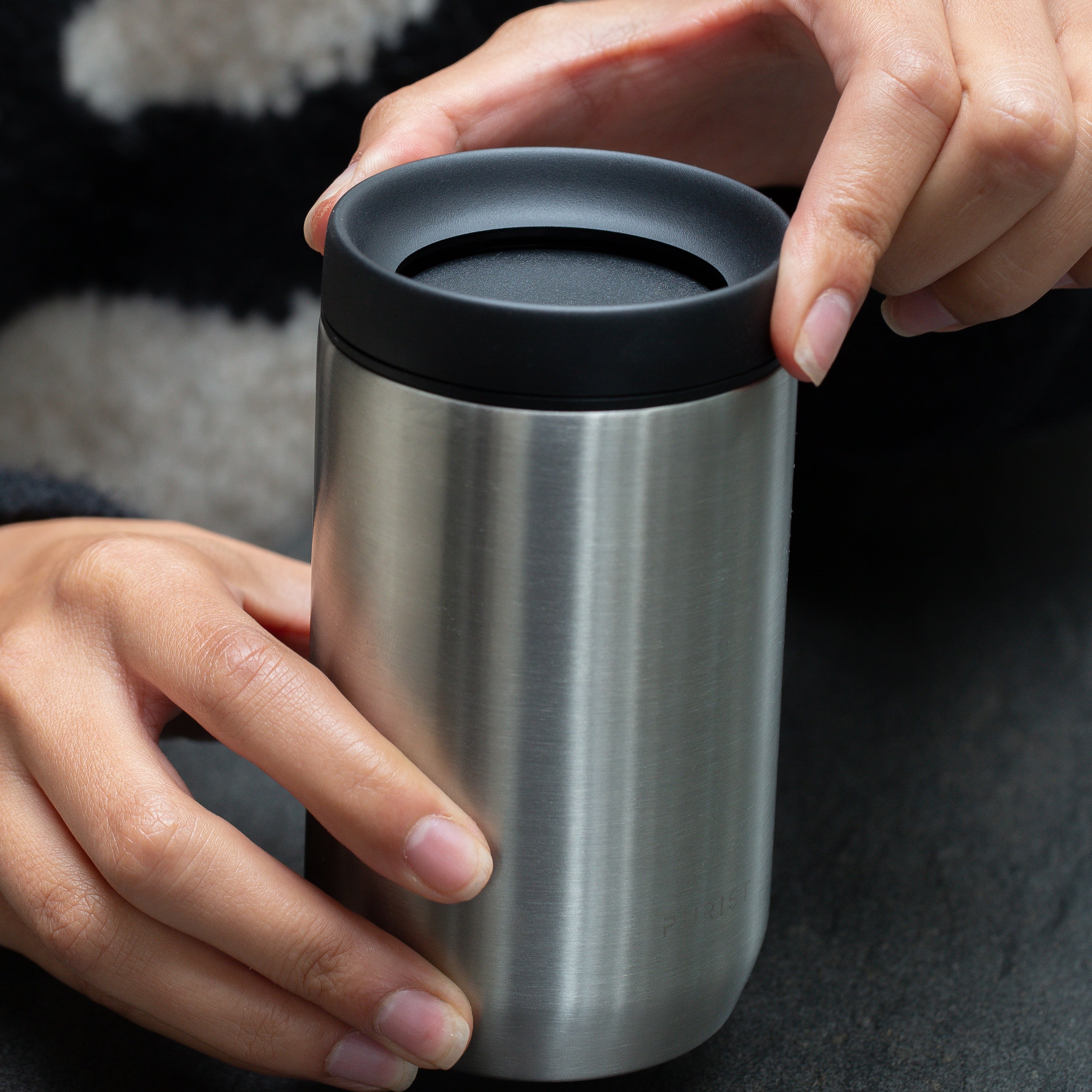 Photo of person opening the Scope Lid on Purist glass-lined 10oz Maker in Bare.