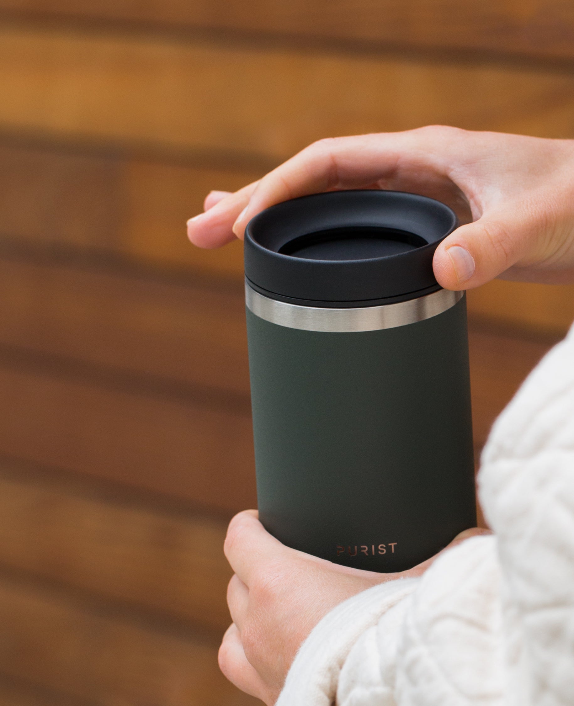 Photo of person opening Purist Collective Maker and Scope Lid in Ever.